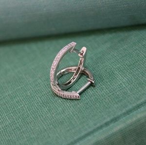 Zales silver and diamond leverback hoops.